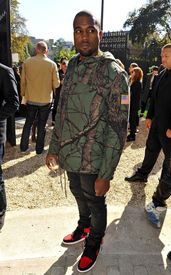 Kanye-West-Supreme-2012-Green-Tree-Camo-Pullover-Jacket-at-the-Celine-2013-Spring-Summer-Fashion-Show-1.jpg