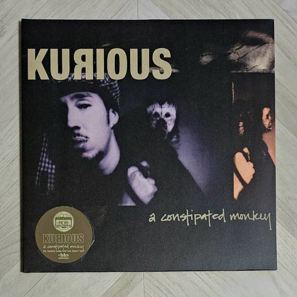 kurious - a constipated monkey.jpg