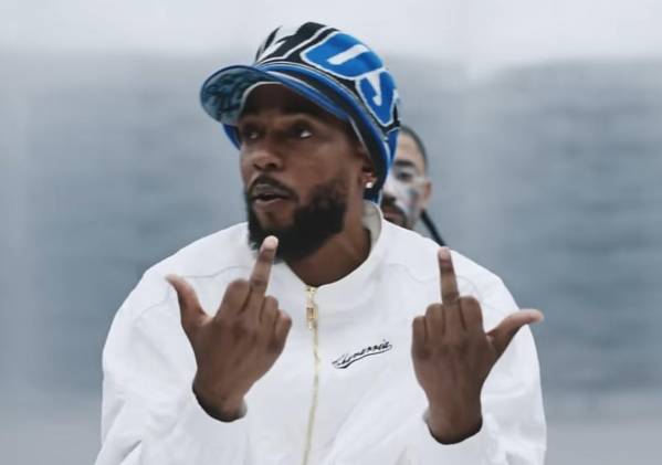 kendrick-showing-two-middle-fingers-being-punished-by-tommy-v0-gd46x3fnbnad1.jpg