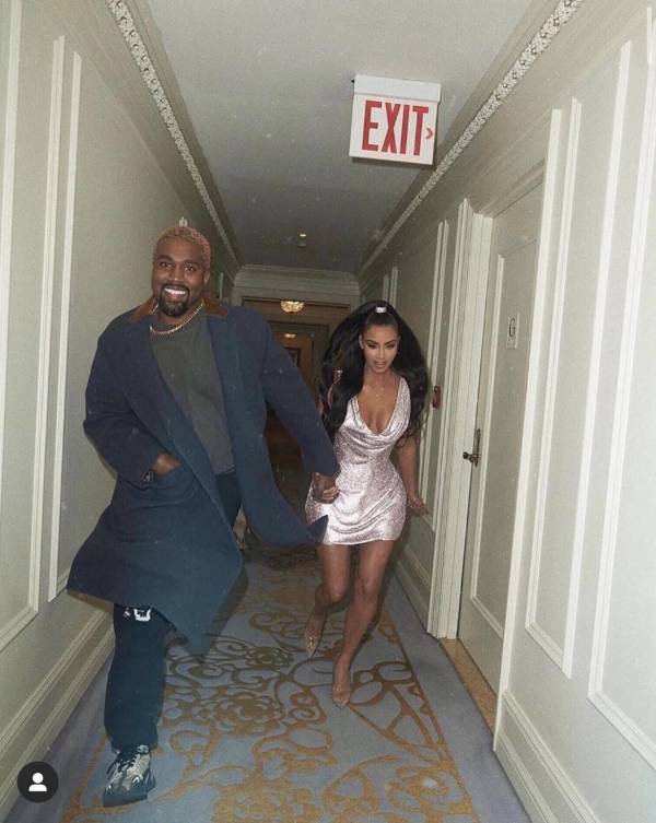 PsBattle_ Kanye and Kim Kardashian running down a hallway.jpeg