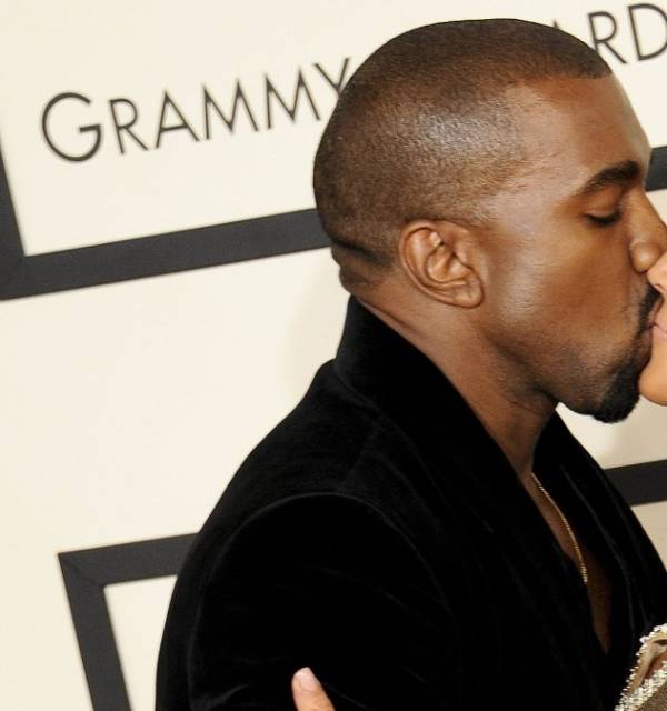 Kanye-West-Kisses-Kim-Kardashian-After-Rocky-Few-Months.jpg