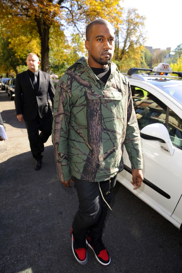 Kanye-West-Supreme-2012-Green-Tree-Camo-Pullover-Jacket-at-the-Celine-2013-Spring-Summer-Fashion2.jpeg